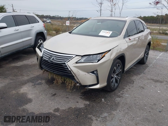 2018 Lexus RX with VIN 2T2ZZMCA9JC099803, listed as a IAAI auction lot 41052078 with 32,423 mi miles. Bid and sale history available at carsss.com. Image 2.