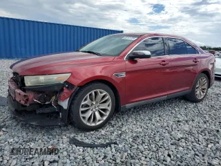 2016 Ford Taurus Limited with VIN 1FAHP2F89GG129403, listed as a Copart auction lot 66161725 with 127,757 mi miles and Salvage title. Bid and sale history available at DreamBid. Image 1.