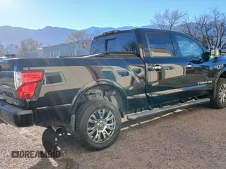 2017 Nissan Titan XD SL with VIN 1N6BA1F40HN561770, listed as a Copart auction lot 44038255 with 79,684 mi miles and Clean Title. Bid and sale history available at carsss.com. Image 4.