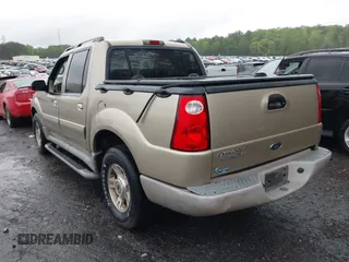 2003 Ford Explorer Sport Trac XLS z VIN 1FMZU67E73UC81240, wystawiony jako IAAI lot #41980985 z przebiegiem 114 644 mil mil oraz . Historia ofert i sprzedaży dostępna na DreamBid. Obrazek 3.
