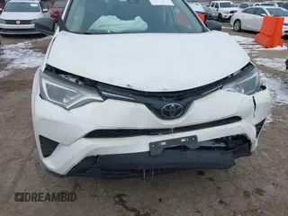 2017 Toyota RAV4 LE with VIN JTMBFREV4HJ170495, listed as a IAAI auction lot 41619488 with 132,751 mi miles and . Bid and sale history available at DreamBid. Image 6.