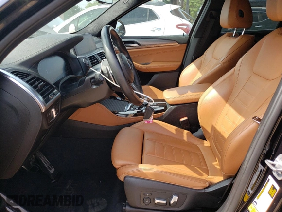 2021 BMW X4 xDrive30i with VIN 5UX2V1C04M9E92675, listed as a Copart auction lot 52495333 with 54,111 mi miles. Bid and sale history available at carsss.com. Image 7.