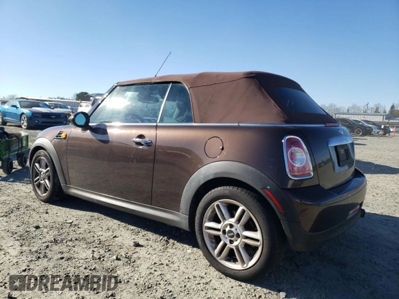 2012 MINI Convertible with VIN WMWZN3C55CT133967, listed as a Copart auction lot 88546705 with 104,357 mi miles and Non repairable. Bid and sale history available at DreamBid. Image 2.