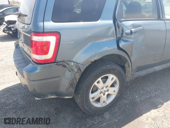 2011 Ford Escape Limited with VIN 1FMCU9EG1BKB19982, listed as a IAAI auction lot 42053239 with 247,669 mi miles. Bid and sale history available at carsss.com. Image 12.