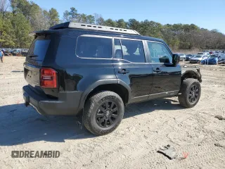 2024 Toyota Land Cruiser z VIN JTEABFAJ5RK002588, wystawiony jako Copart lot #45684165 z przebiegiem 6 313 mil mil oraz Szkoda całkowita • Salvage title. Historia ofert i sprzedaży dostępna na DreamBid. Obrazek 3.