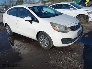 2013 Kia Rio LX with VIN KNADM4A37D6240703, listed as a IAAI auction lot 41938543 with NaN miles. Bid and sale history available at carsss.com. Image 1.