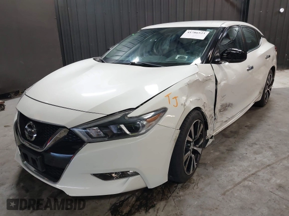 2018 Nissan Maxima SV with VIN 1N4AA6AP7JC406251, listed as a IAAI auction lot 41786523 with 117,403 mi miles and . Bid and sale history available at DreamBid. Image 17.