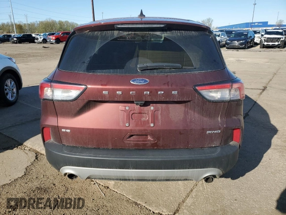 2021 Ford Escape SE with VIN 1FMCU9G67MUA94906, listed as a Copart auction lot 54310725 with 84,595 mi miles and Salvage title. Bid and sale history available at DreamBid. Image 6.
