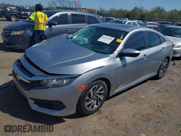 2018 Honda Civic EX with VIN 19XFC2F7XJE015793, listed as a IAAI auction lot 41991788 with 115,137 mi miles and . Bid and sale history available at DreamBid. Image 2.