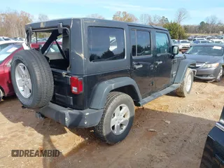 2017 Jeep Wrangler Unlimited Sport with VIN 1C4BJWDG7HL745466, listed as a IAAI auction lot 41040828 with 86,269 mi miles. Bid and sale history available at carsss.com. Image 4.