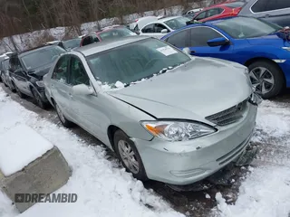 2004 Toyota Camry LE with VIN 4T1BF32K64U588682, listed as a IAAI auction lot 41520570 with 112,646 mi miles. Bid and sale history available at carsss.com. Image 1.