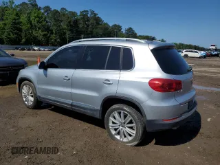 2012 Volkswagen Tiguan SEL with VIN WVGAV7AX4CW606067, listed as a Copart auction lot 55853675 with 185,118 mi miles and Clean Title. Bid and sale history available at DreamBid. Image 2.