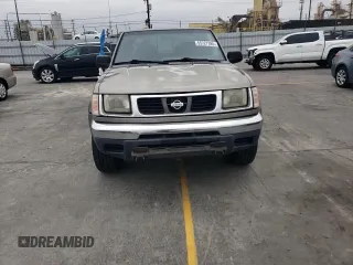 2000 Nissan Frontier XE with VIN 1N6ED27T8YC357939, listed as a Copart auction lot 55727395 with 143,842 mi miles and Salvage title. Bid and sale history available at DreamBid. Image 13.