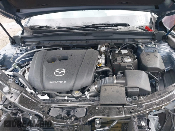 2024 Mazda CX-50 S Select with VIN 7MMVABAM9RN203355, listed as a IAAI auction lot 40399675 with 5,415 mi miles and . Bid and sale history available at DreamBid. Image 10.