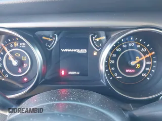 2021 Jeep Wrangler Unlimited Sport S with VIN 1C4HJXDG5MW804748, listed as a IAAI auction lot 41878895 with 35,839 mi miles and . Bid and sale history available at DreamBid. Image 7.