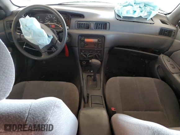 2001 Toyota Camry CE z VIN 4T1BG22K11U017054, wystawiony jako Copart lot #57623485 z przebiegiem 242 217 mil mil oraz Szkoda całkowita • Salvage title. Historia ofert i sprzedaży dostępna na DreamBid. Obrazek 8.