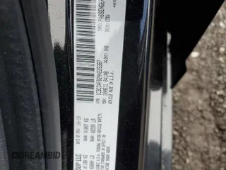 2010 Chrysler Sebring Touring with VIN 1C3CC4FB2AN229387, listed as a Copart auction lot 50753875 with 61,570 mi miles and Salvage Title. Bid and sale history available at DreamBid. Image 14.