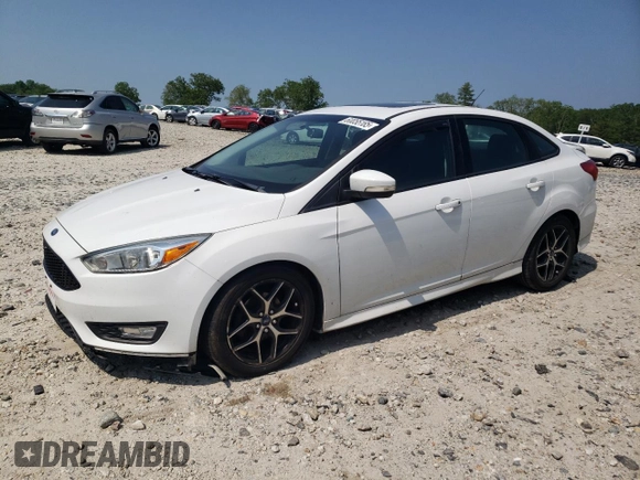 2015 Ford Focus SE with VIN 1FADP3F28FL332899, listed as a Copart auction lot 60055185 with 76,948 mi miles and Clean title. Bid and sale history available at DreamBid. Image 1.