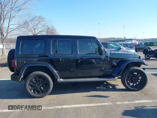 2021 Jeep Wrangler Unlimited Sahara with VIN 1C4JJXP62MW826470, listed as a IAAI auction lot 41651709 with 44,677 mi miles and . Bid and sale history available at carsss.com. Image 13.
