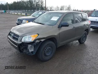 2009 Toyota RAV4 with VIN JTMZF33V995001985, listed as a IAAI auction lot 41932410 with 113,713 mi miles. Bid and sale history available at carsss.com. Image 2.