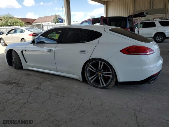 2016 Porsche Panamera 4 with VIN WP0AA2A75GL000111, listed as a Copart auction lot 53202714 with 130,189 mi miles and Salvage Title. Bid and sale history available at carsss.com. Image 2.
