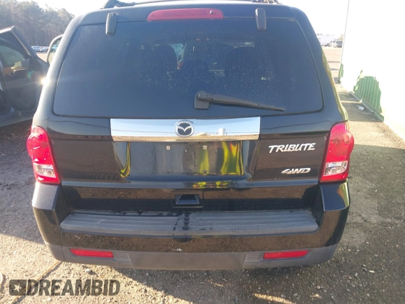 2010 Mazda Tribute Sport with VIN 4F2CY9C74AKM03679, listed as a IAAI auction lot 41740156 with 142,208 mi miles and . Bid and sale history available at DreamBid. Image 16.