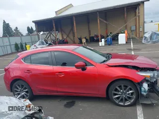 2018 Mazda 3 Touring with VIN 3MZBN1L33JM187560, listed as a IAAI auction lot 41692954 with 58,396 mi miles. Bid and sale history available at carsss.com. Image 14.