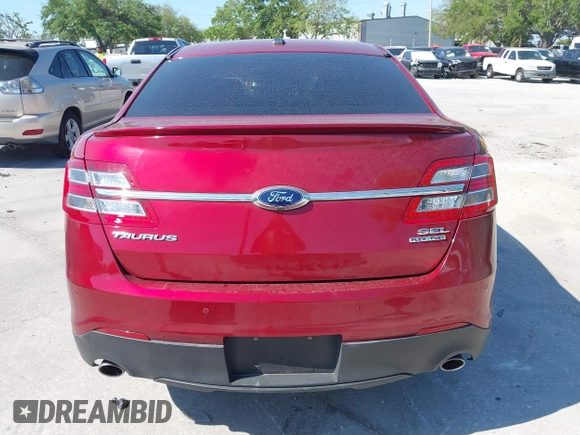 2014 Ford Taurus SEL with VIN 1FAHP2E86EG186642, listed as a IAAI auction lot 41901768 with 106,057 mi miles. Bid and sale history available at carsss.com. Image 16.