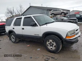 2003 Chevrolet Blazer LS z VIN 1GNDT13X63K106315, wystawiony jako IAAI lot #41914116 z przebiegiem 196 774 mil mil oraz . Historia ofert i sprzedaży dostępna na DreamBid. Obrazek 13.