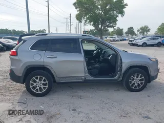 2014 Jeep Cherokee Altitude with VIN 1C4PJMCB4EW107556, listed as a IAAI auction lot 41881448 with 212,816 mi miles and . Bid and sale history available at carsss.com. Image 14.