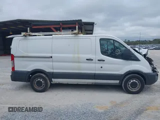2016 Ford Transit Cargo z VIN 1FTYE1YMXGKB48964, wystawiony jako IAAI lot #41227860 z przebiegiem Nie podano mil oraz . Historia ofert i sprzedaży dostępna na DreamBid. Obrazek 14.