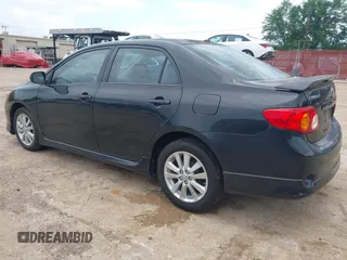 2009 Toyota Corolla with VIN 1NXBU40E19Z135389, listed as a IAAI auction lot 42188550 with 215,054 mi miles. Bid and sale history available at carsss.com. Image 3.