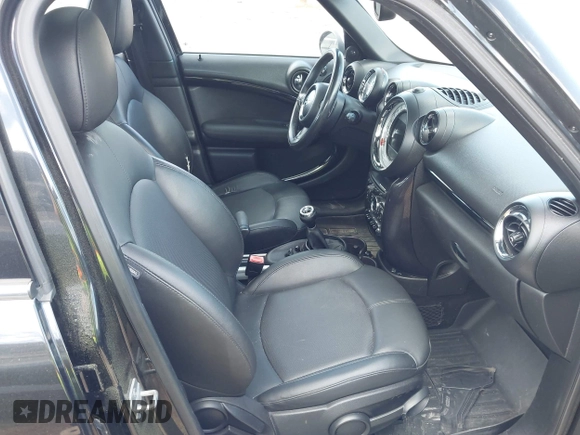 2013 MINI Countryman S ALL4 with VIN WMWZC5C57DWM15738, listed as a IAAI auction lot 42286913 with 175,299 mi miles and . Bid and sale history available at DreamBid. Image 5.