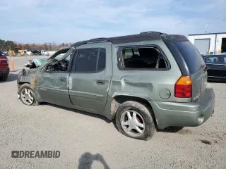2004 GMC Envoy XL SLE with VIN 1GKET16S346115131, listed as a Copart auction lot 82677024 with 290,656 mi miles and Salvage Title. Bid and sale history available at carsss.com. Image 2.