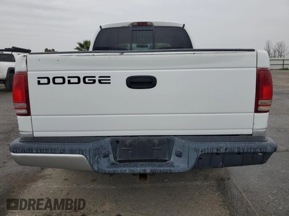 2002 Dodge Dakota SLT z VIN 1B7HL48N22S636413, wystawiony jako Copart lot #47884475 z przebiegiem 226 723 mil mil oraz Czysty tytuł • Clean title. Historia ofert i sprzedaży dostępna na DreamBid. Obrazek 6.