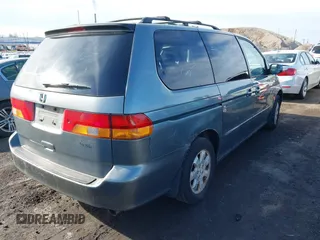 2002 Honda Odyssey EX-L z VIN 5FNRL180X2B022889, wystawiony jako IAAI lot #41546405 z przebiegiem 162 395 mil mil oraz . Historia ofert i sprzedaży dostępna na DreamBid. Obrazek 4.