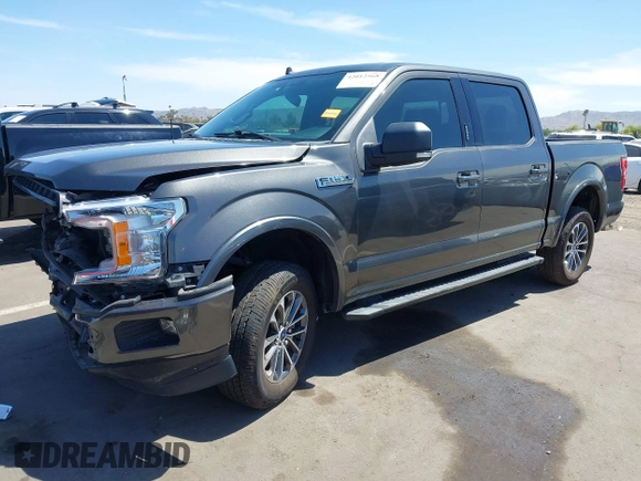 2019 Ford F-150 XL with VIN 1FTEW1C44KKE81550, listed as a IAAI auction lot 42012568 with 53,978 mi miles and . Bid and sale history available at carsss.com. Image 2.