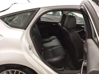2014 Ford Focus Titanium with VIN 1FADP3N27EL110287, listed as a IAAI auction lot 42210697 with 107,741 mi miles and . Bid and sale history available at DreamBid. Image 8.