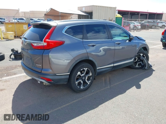 2018 Honda CR-V Touring with VIN 7FARW1H90JE030766, listed as a IAAI auction lot 41637900 with Not Provided miles and . Bid and sale history available at DreamBid. Image 4.