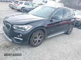 2017 BMW X1 sDrive28i with VIN WBXHU7C36HP924874, listed as a IAAI auction lot 41368396 with 113,443 mi miles. Bid and sale history available at carsss.com. Image 16.