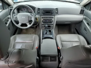 2005 Jeep Grand Cherokee Laredo with VIN 1J4GR48KX5C565762, listed as a Copart auction lot 63080115 with 122,349 mi miles and Salvage title. Bid and sale history available at DreamBid. Image 8.