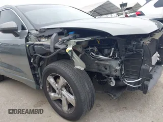 2020 Audi Q3 Premium z VIN WA1AECF32L1061271, wystawiony jako IAAI lot #42038795 z przebiegiem 23 902 mil mil oraz . Historia ofert i sprzedaży dostępna na DreamBid. Obrazek 19.