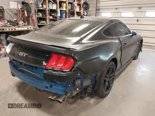 2023 Ford Mustang GT with VIN 1FA6P8CF8P5305334, listed as a IAAI auction lot 41858115 with 23,574 mi miles and . Bid and sale history available at DreamBid. Image 4.