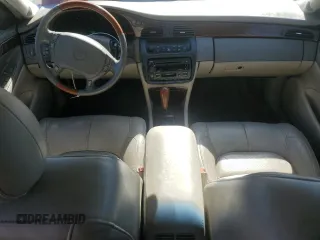 2002 Cadillac DeVille DTS with VIN 1G6KF57942U231877, listed as a Copart auction lot 76724554 with 180,082 mi miles and Salvage Title. Bid and sale history available at carsss.com. Image 8.