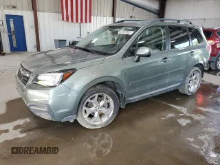 2017 Subaru Forester Touring z VIN JF2SJAWC5HH572306, wystawiony jako Copart lot #63699995 z przebiegiem Nie podano mil oraz Szkoda całkowita • Salvage title. Historia ofert i sprzedaży dostępna na DreamBid. Obrazek 1.