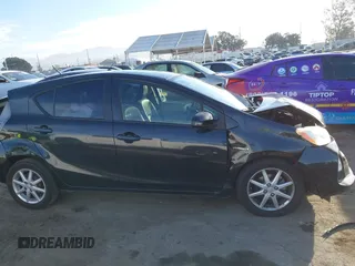 2012 Toyota Prius c One with VIN JTDKDTB36C1010956, listed as a IAAI auction lot 41476271 with 186,403 mi miles. Bid and sale history available at carsss.com. Image 13.