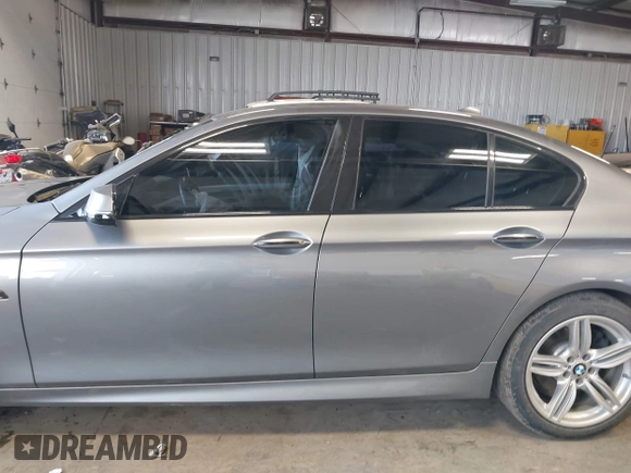 2014 BMW 5 Series 528i xDrive with VIN WBA5A7C5XED613856, listed as a IAAI auction lot 42018901 with 121,783 mi miles and . Bid and sale history available at DreamBid. Image 14.