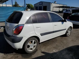 2006 Kia Rio SX with VIN KNADE163066058381, listed as a Copart auction lot 72277274 with 112,802 mi miles and Salvage Title. Bid and sale history available at carsss.com. Image 3.