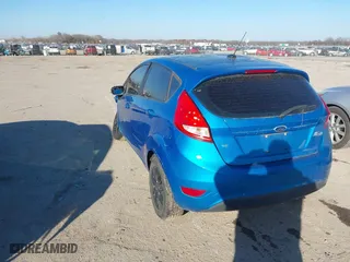 2012 Ford Fiesta SE with VIN 3FADP4EJ6CM131947, listed as a IAAI auction lot 41013636 with 148,195 mi miles. Bid and sale history available at carsss.com. Image 3.