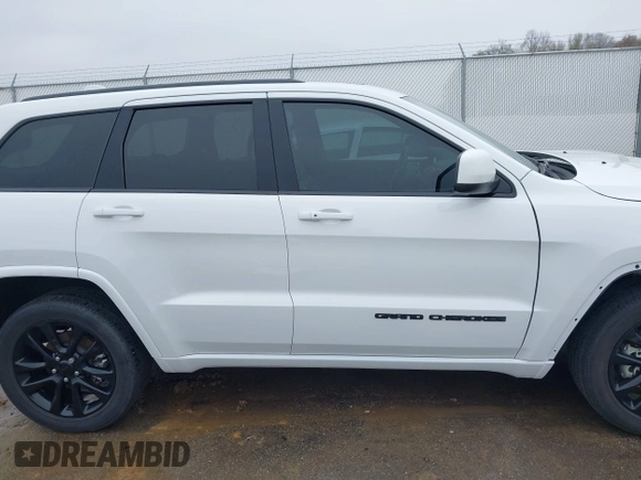 2021 Jeep Grand Cherokee Laredo E with VIN 1C4RJEAG7MC713026, listed as a IAAI auction lot 42010894 with 37,336 mi miles and . Bid and sale history available at DreamBid. Image 14.
